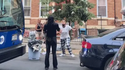 Furious mother-daughter duo viciously attacks driver for moving trash cans reserving parking spot: video
