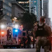 Gunman Fatally Shoots Officer and 3 Others in Midtown Office Tower